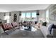 Bright living room featuring comfortable seating, large windows, and stylish decor at 3628 Planck Cir, Danville, IN 46122