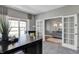 Study with built-in shelving and view of backyard at 3628 Planck Cir, Danville, IN 46122