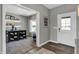 Home office with built-in shelves, desk, and window at 3628 Planck Cir, Danville, IN 46122