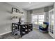 Study featuring desk, window seat, and French doors at 3628 Planck Cir, Danville, IN 46122