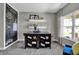Study with chalkboard wall, desk, and comfortable seating at 3628 Planck Cir, Danville, IN 46122