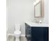 Bathroom with navy vanity and marble countertop at 408 W 11Th St, Anderson, IN 46016