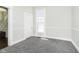 Simple bedroom with gray carpet and neutral walls at 408 W 11Th St, Anderson, IN 46016