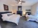 Spacious bedroom with king-size bed and fireplace at 408 W 11Th St, Anderson, IN 46016