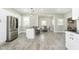 Modern kitchen with stainless steel appliances and breakfast bar at 408 W 11Th St, Anderson, IN 46016
