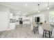 Modern white kitchen with stainless steel appliances and an island at 408 W 11Th St, Anderson, IN 46016