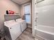 Laundry room with washer, dryer, and built-in shelving at 408 W 11Th St, Anderson, IN 46016