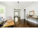Open living space with hardwood floors and view to sitting area at 408 W 11Th St, Anderson, IN 46016