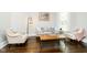 Cozy sitting area with hardwood floors and comfortable seating at 408 W 11Th St, Anderson, IN 46016