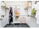 Spacious walk-in closet with custom shelving and hanging rods at 408 W 11Th St, Anderson, IN 46016