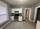 Clean kitchen featuring white cabinets and stainless steel appliances at 4130 Rookwood Ave, Indianapolis, IN 46208