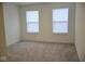 Bright bedroom with neutral walls and carpeting at 9442 Larson Dr, Pendleton, IN 46064