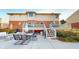 Large deck with patio furniture and stairs leading to the backyard at 1160 Mt Vernon Dr, Greenwood, IN 46142