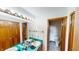 Bathroom with double sinks, and separate shower and toilet area at 1160 Mt Vernon Dr, Greenwood, IN 46142