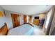 Bedroom with a double bed and wood dresser, offering good storage at 1160 Mt Vernon Dr, Greenwood, IN 46142