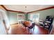 Formal dining room with hardwood floors and large window at 1160 Mt Vernon Dr, Greenwood, IN 46142
