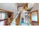 Two-story foyer with hardwood floors and staircase at 1160 Mt Vernon Dr, Greenwood, IN 46142