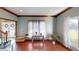 Living room with hardwood floors and large windows at 1160 Mt Vernon Dr, Greenwood, IN 46142