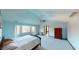 Main bedroom with vaulted ceiling, carpet, and ensuite bathroom access at 1160 Mt Vernon Dr, Greenwood, IN 46142