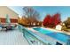 Elevated deck overlooking a refreshing pool; perfect for summer entertaining at 1160 Mt Vernon Dr, Greenwood, IN 46142