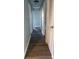 Bright hallway with light gray walls and wood-look flooring at 1601 Draper St, Indianapolis, IN 46203