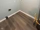Laundry room with vinyl flooring and gas water heater at 1601 Draper St, Indianapolis, IN 46203