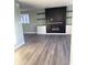 Spacious living room with a modern fireplace and built-in shelving at 1601 Draper St, Indianapolis, IN 46203
