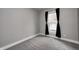 Simple bedroom with grey carpet and neutral-toned walls at 400 E Hamilton Ave, Arcadia, IN 46030