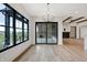 Dining room with hardwood floors, sliding glass doors, and view of backyard at 5035 Abington Way, Zionsville, IN 46077