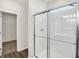 Clean bathroom with a walk-in shower and linen closet at 7139 Rose Hill Ave, Brownsburg, IN 46112
