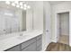 Modern bathroom with gray vanity, quartz countertop and walk-in shower at 7139 Rose Hill Ave, Brownsburg, IN 46112