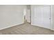 Bedroom with double door closet and access to bathroom at 7139 Rose Hill Ave, Brownsburg, IN 46112
