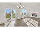 Open concept dining room with fireplace and kitchen views at 7139 Rose Hill Ave, Brownsburg, IN 46112