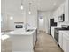 Modern kitchen with stainless steel appliances and an island at 7139 Rose Hill Ave, Brownsburg, IN 46112