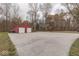 Large paved basketball court with hoop at 8190 Beech Grove Rd, Martinsville, IN 46151