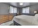 Cozy bedroom with a dresser and neutral-toned bedding at 8190 Beech Grove Rd, Martinsville, IN 46151