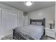 Bedroom with full bed, gray walls, and a white dresser at 8190 Beech Grove Rd, Martinsville, IN 46151