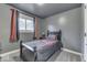 Small bedroom with a twin-size bed and gray walls at 8190 Beech Grove Rd, Martinsville, IN 46151