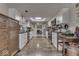 Modern kitchen with stainless steel appliances and white cabinets at 8190 Beech Grove Rd, Martinsville, IN 46151