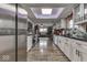 Modern kitchen with stainless steel appliances and white shaker cabinets at 8190 Beech Grove Rd, Martinsville, IN 46151