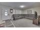 Large living room with sectional sofa, TV, and fireplace at 8190 Beech Grove Rd, Martinsville, IN 46151