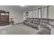 Spacious living room featuring a large sectional sofa and ample natural light at 8190 Beech Grove Rd, Martinsville, IN 46151