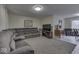 Spacious living room with sectional sofa and wood entertainment center at 8190 Beech Grove Rd, Martinsville, IN 46151