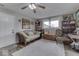 Home office with built-in desk, comfortable seating, and backyard access at 8190 Beech Grove Rd, Martinsville, IN 46151