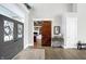 Open concept entry with double doors and a view to office at 13613 Lake Ridge Ln, Fishers, IN 46055
