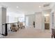 Spacious upper landing with comfortable seating area and natural light at 13613 Lake Ridge Ln, Fishers, IN 46055