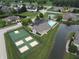 Aerial view of community amenities including pool, tennis, and basketball courts at 2327 Saddle Dr, Shelbyville, IN 46176