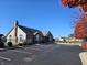 Community clubhouse with parking lot and autumn trees at 2327 Saddle Dr, Shelbyville, IN 46176