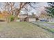 House with a large backyard, attached garage, and shed at 4902 N Capitol Ave, Indianapolis, IN 46208