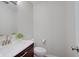 Clean bathroom with white vanity, toilet and shower at 4902 N Capitol Ave, Indianapolis, IN 46208
